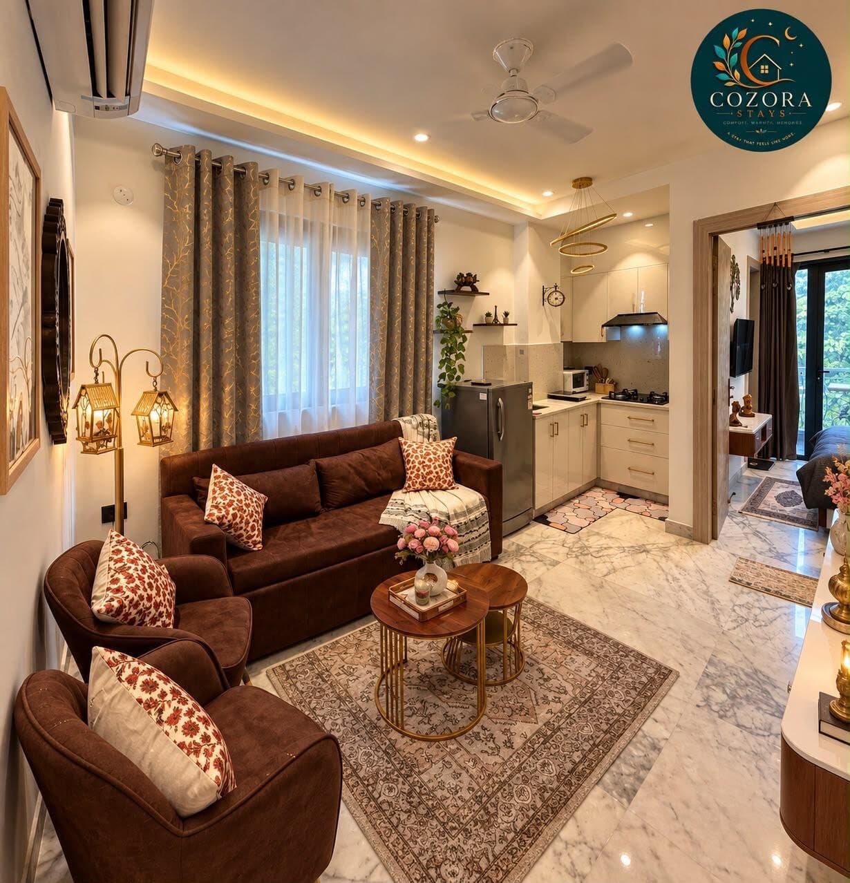 Living room with a rust velvet sofa and armchairs on a Persian-style rug, opening through to the kitchen